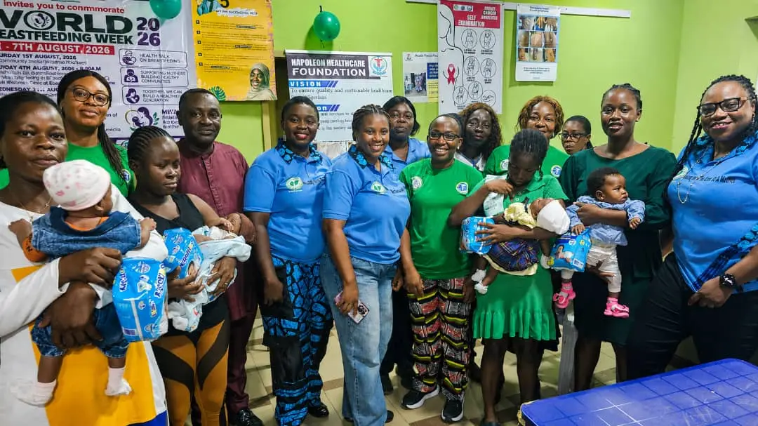 Mothers and babies with the NHF and MWAN team at the Infant Welfare Clinic, DELSUTH, Oghara